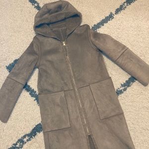 Faux-fur lined tan suede jacket with gold zipper